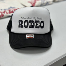 Load image into Gallery viewer, This Ain&#39;t My First Rodeo | Black | Trucker Hat: Black Trucker Hat

